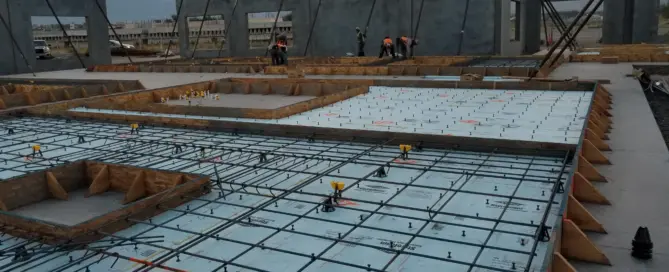 150000 sq ft tilt-up concrete panels, parking lot, sidewalks, curb and gutter, and ADA ramps — commercial concrete contractors M&M Concrete Albuquerque NM