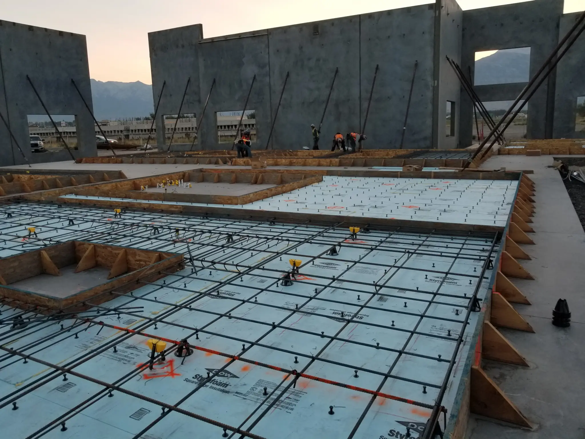 150000 sq ft tilt-up concrete panels, parking lot, sidewalks, curb and gutter, and ADA ramps — commercial concrete contractors M&M Concrete Albuquerque NM